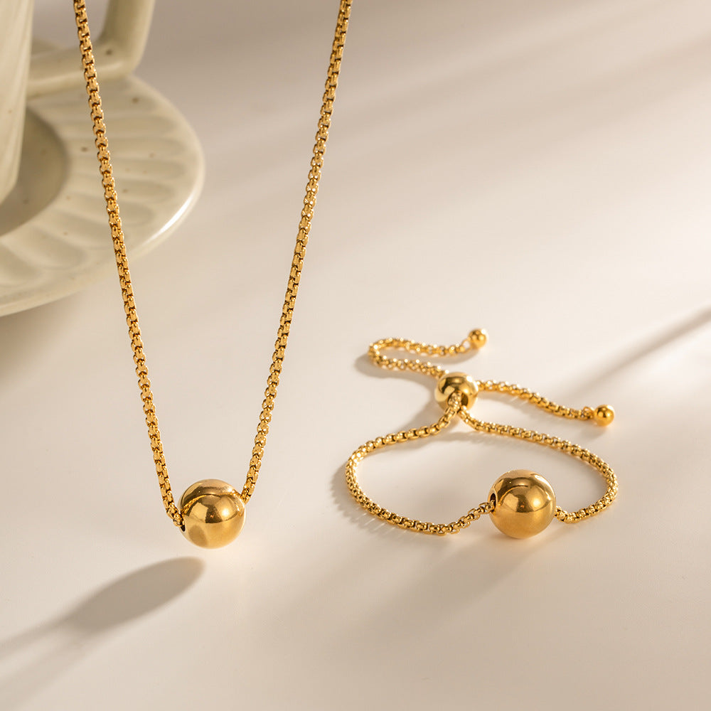 Collier pour femme avec pendentif boule élégant et brillant