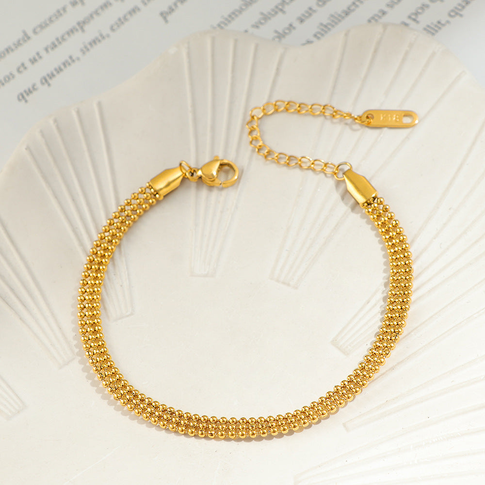 Bracelet chaîne texturé doré pour femme