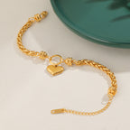 Bracelet pour femme avec pendentif cœur et tresse