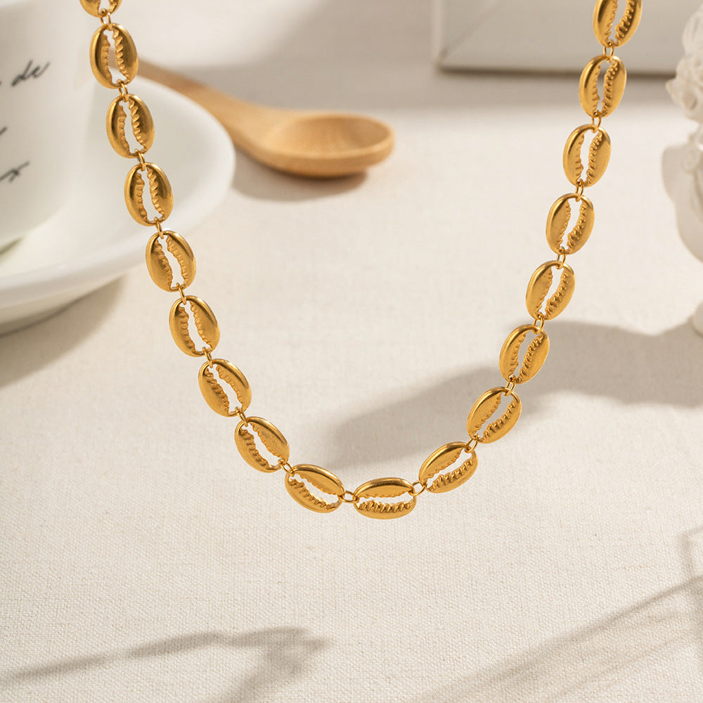 Collier pour femme avec pendentifs coquillages et fermoir réglable en acier inoxydable