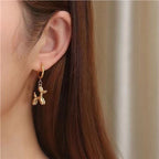 Boucles d'oreilles chien ludique en métal