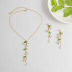 Boucles d'oreilles pour femme avec pendentifs floraux et perles