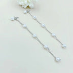 Boucles d'oreilles pendantes chaîne et perles