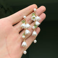 Boucles d'oreilles pour femme avec pendentifs floraux et perles
