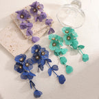 Boucles d'oreilles pendantes pour femme motif floral