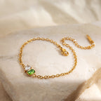 Bracelet pour femme avec pierre précieuse verte et accents en zircone