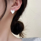 Clous d'oreilles pour femme motif cœur