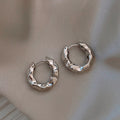 Boucles d'oreilles structurées en acier inoxydable
