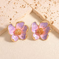 Clous d'oreilles pour femme motif floral