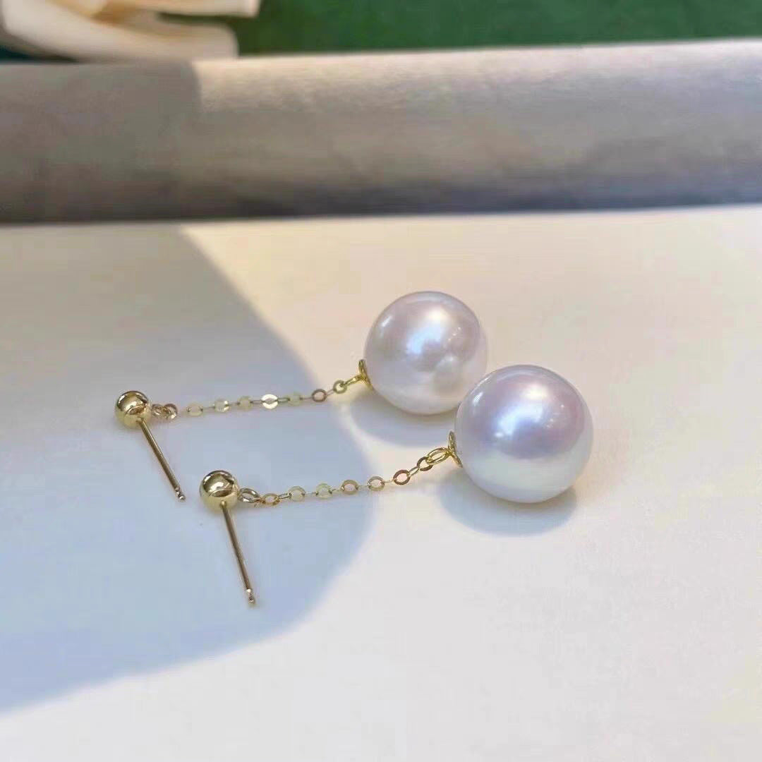Boucles d'oreilles pendantes délicates avec perles pour femme