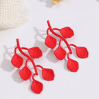 Boucles d'oreilles pour femme au design feuille moderne