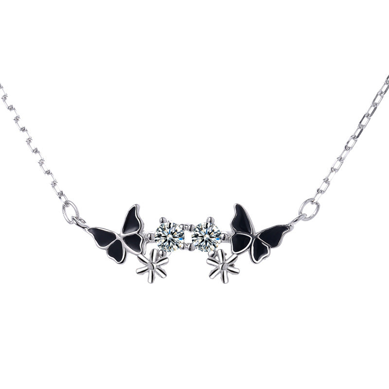 Collier pour femme avec papillons délicats et zircons étincelants