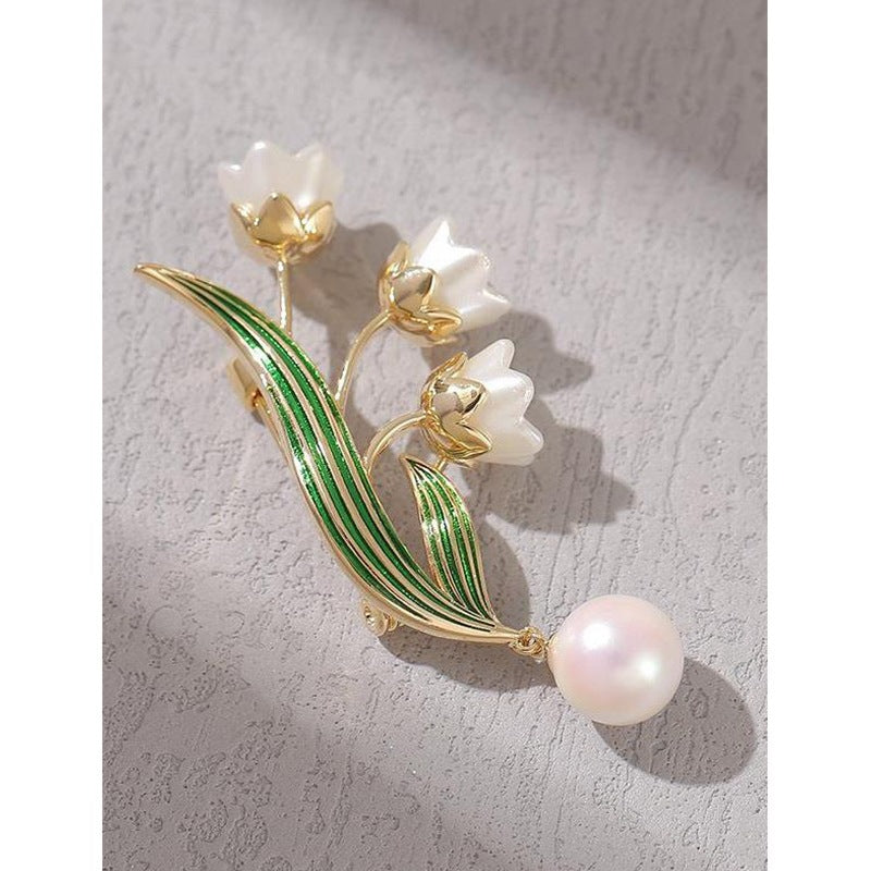 Broche fleur élégante avec pendentif perle