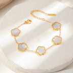 Bracelet chaîne dorée à motif floral pour femme