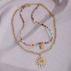 Collier 2 rangs pour femme avec perles colorées et symbole de soleil
