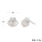 Boucles d'oreilles clous pour femme design pointes moderne
