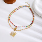 Collier 2 rangs pour femme avec perles colorées et symbole de soleil