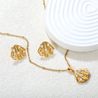 Parure de bijoux pour femme avec pendentif coquillage et zircone