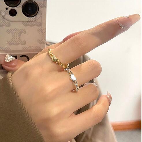 Bague pour femme motif cœur et structure à maillons