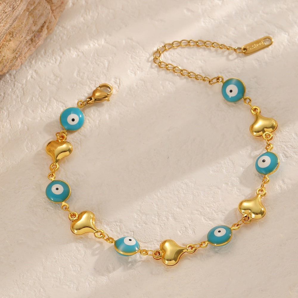 Bracelet femme avec pendentifs artistiques