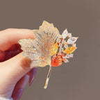 Broche feuille avec cristaux scintillants
