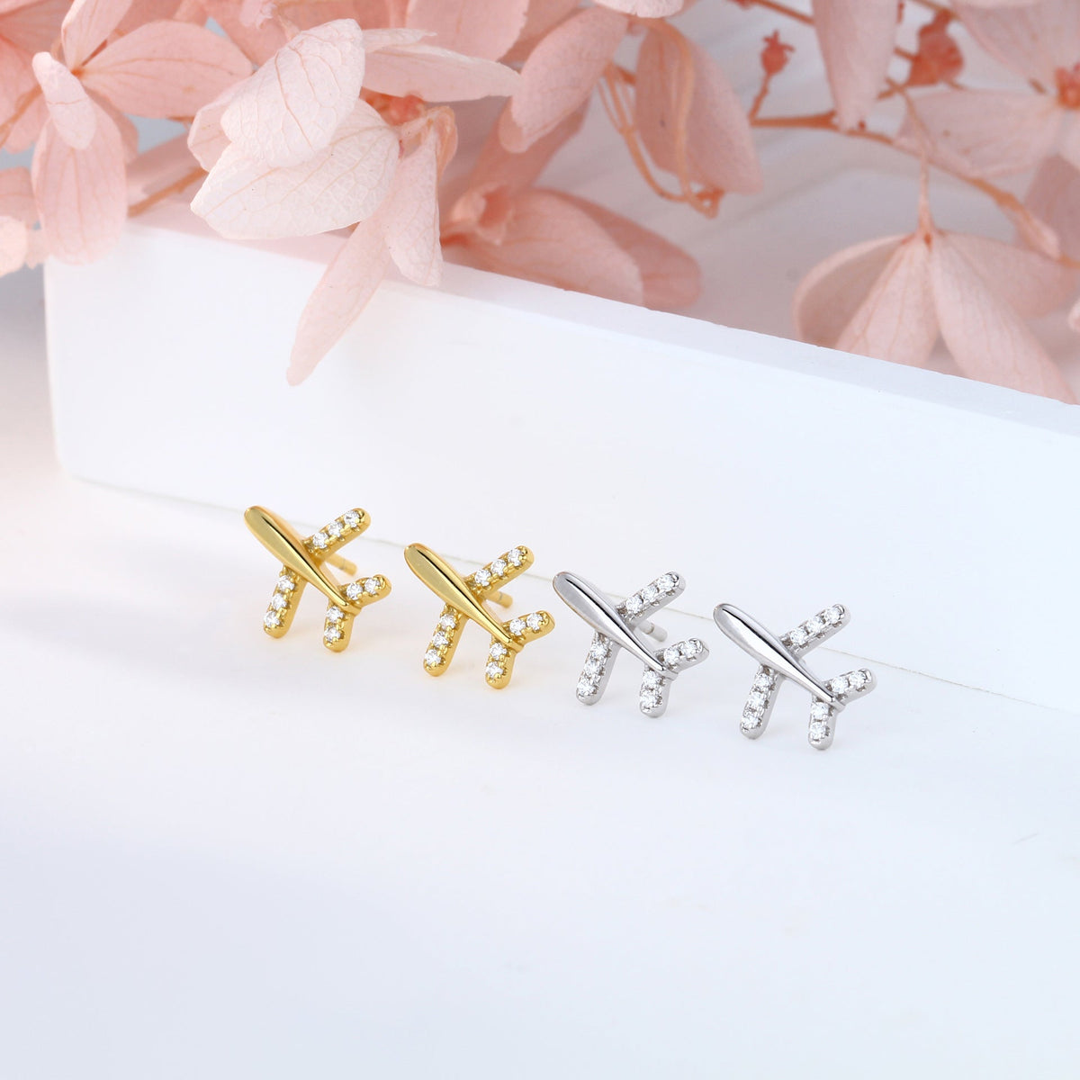 Clous d'oreilles pour femme design avion moderne avec strass