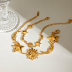 Bracelet pour femme avec pendentifs soleil, lune et étoiles en acier inoxydable