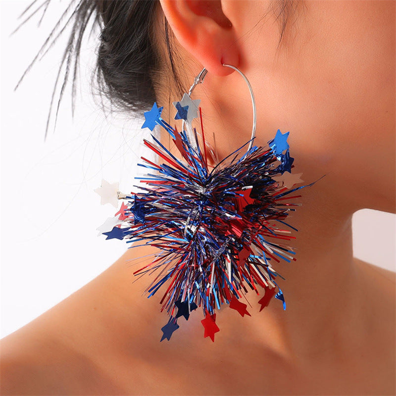 Boucles d'oreilles créoles à pompons métallisés festifs