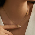 Collier personnalisé pour femme avec pendentif initiale et croix