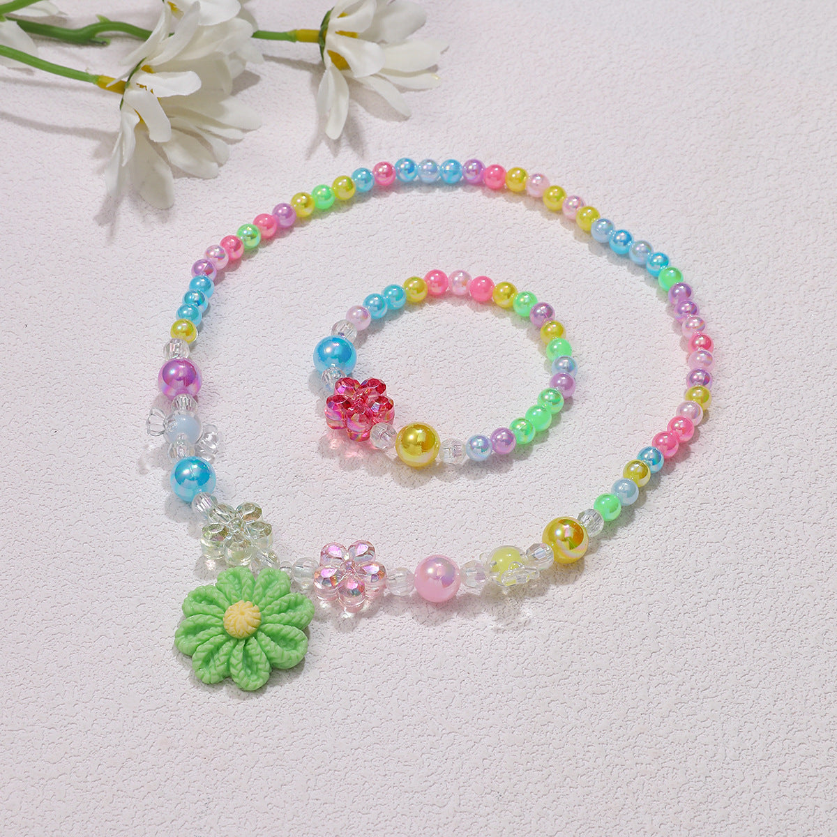 Ensemble de bijoux ludique avec pendentif fleur