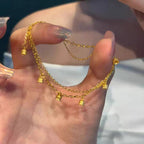 Bracelet de cheville pour femme avec breloques clochettes