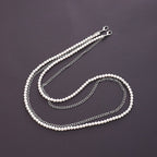 Collier élégant perles et chaîne