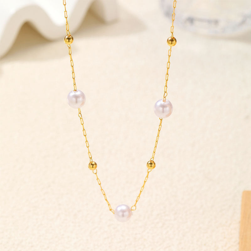 Collier élégant perles et chaîne dorée