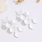 Boucles d'oreilles pour femme au design feuille moderne