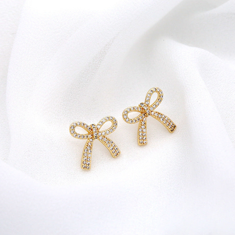 Boucles d'oreilles nœud pour femme avec cristaux étincelants