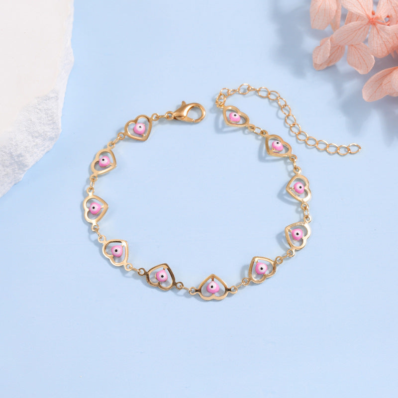 Bracelet de perles en forme de cœur