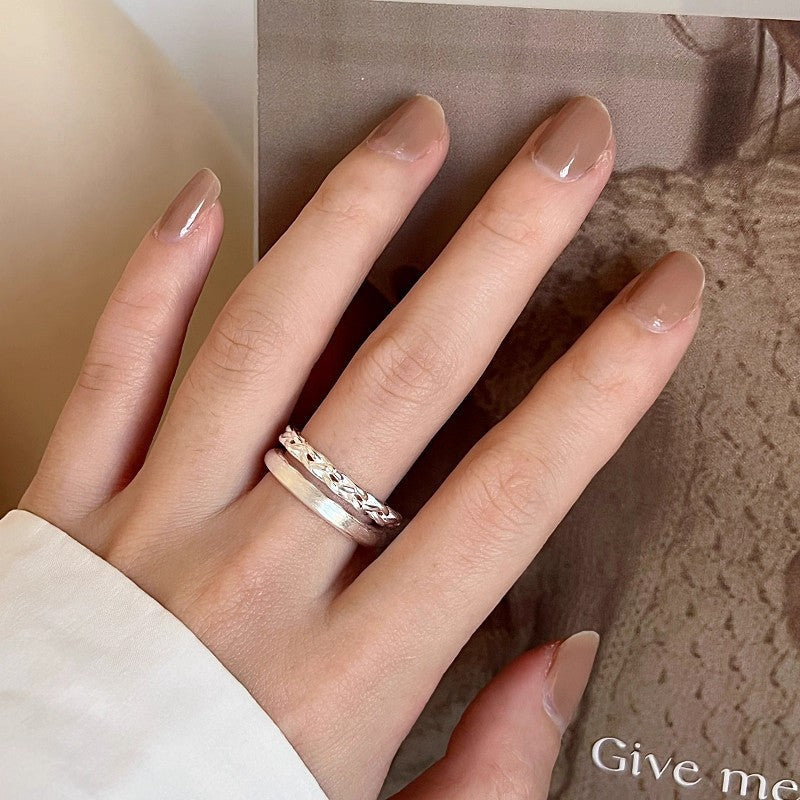 Bague ouverte en argent pour femme avec design tressé et brillant