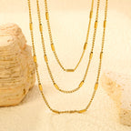 Collier multicouche pour femme au design moderne avec longueurs réglables