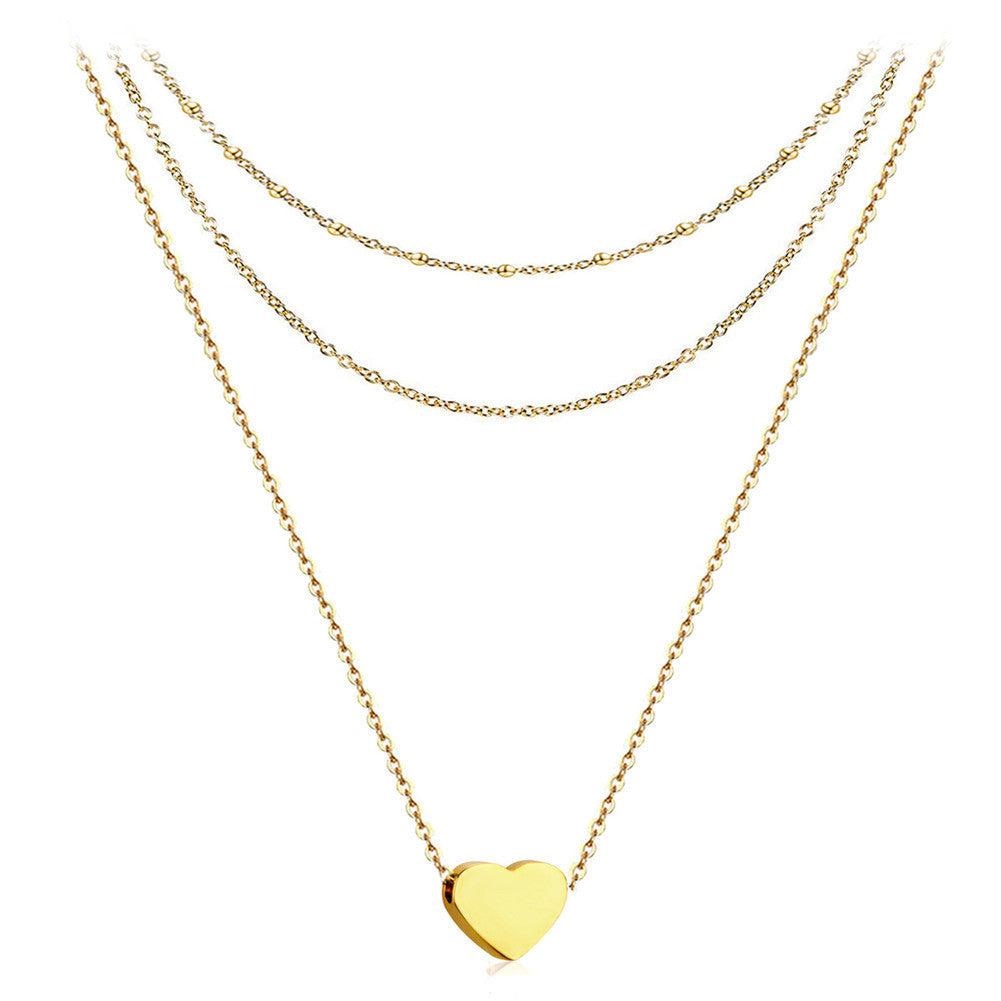 Collier pour femme avec chaînes superposées et pendentif cœur