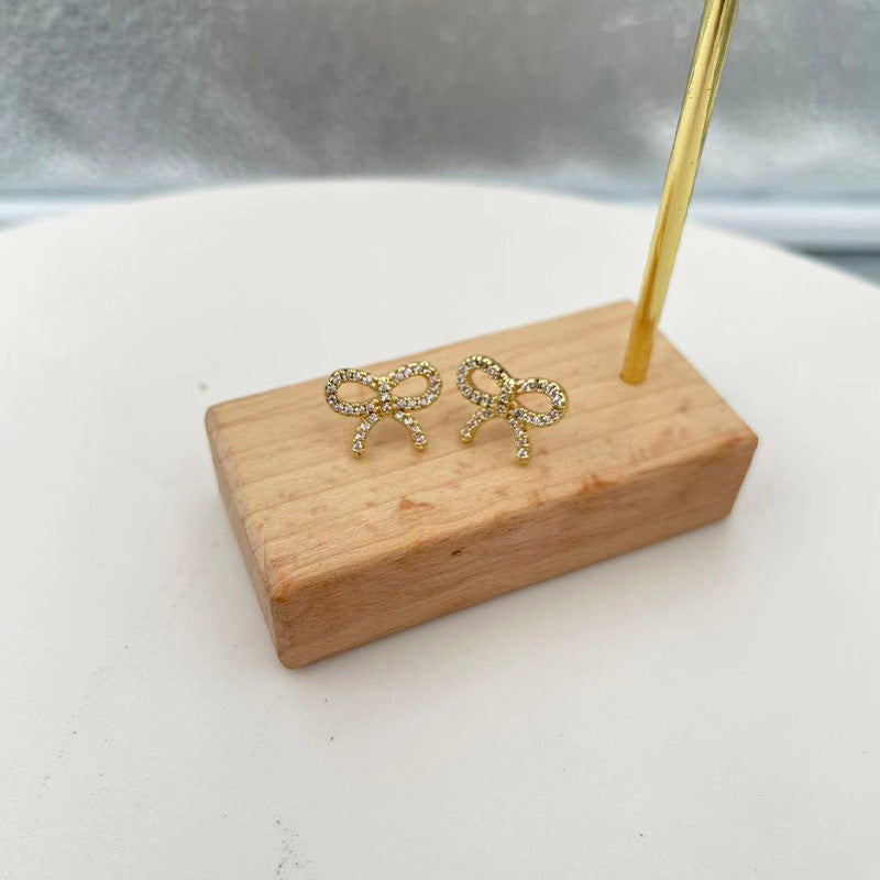 Boucles d'oreilles nœud pour femme avec cristaux étincelants
