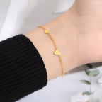 Bracelet pour femme avec pendentifs cœurs