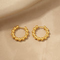 Boucles d'oreilles créoles perlées pour femme