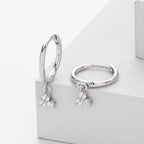 Boucles d'oreilles pendantes avec accents de zircon