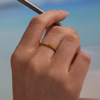 Bague crantée dorée en acier inoxydable pour femme