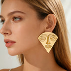 Boucles d'oreilles pour femmes avec design de visage artistique