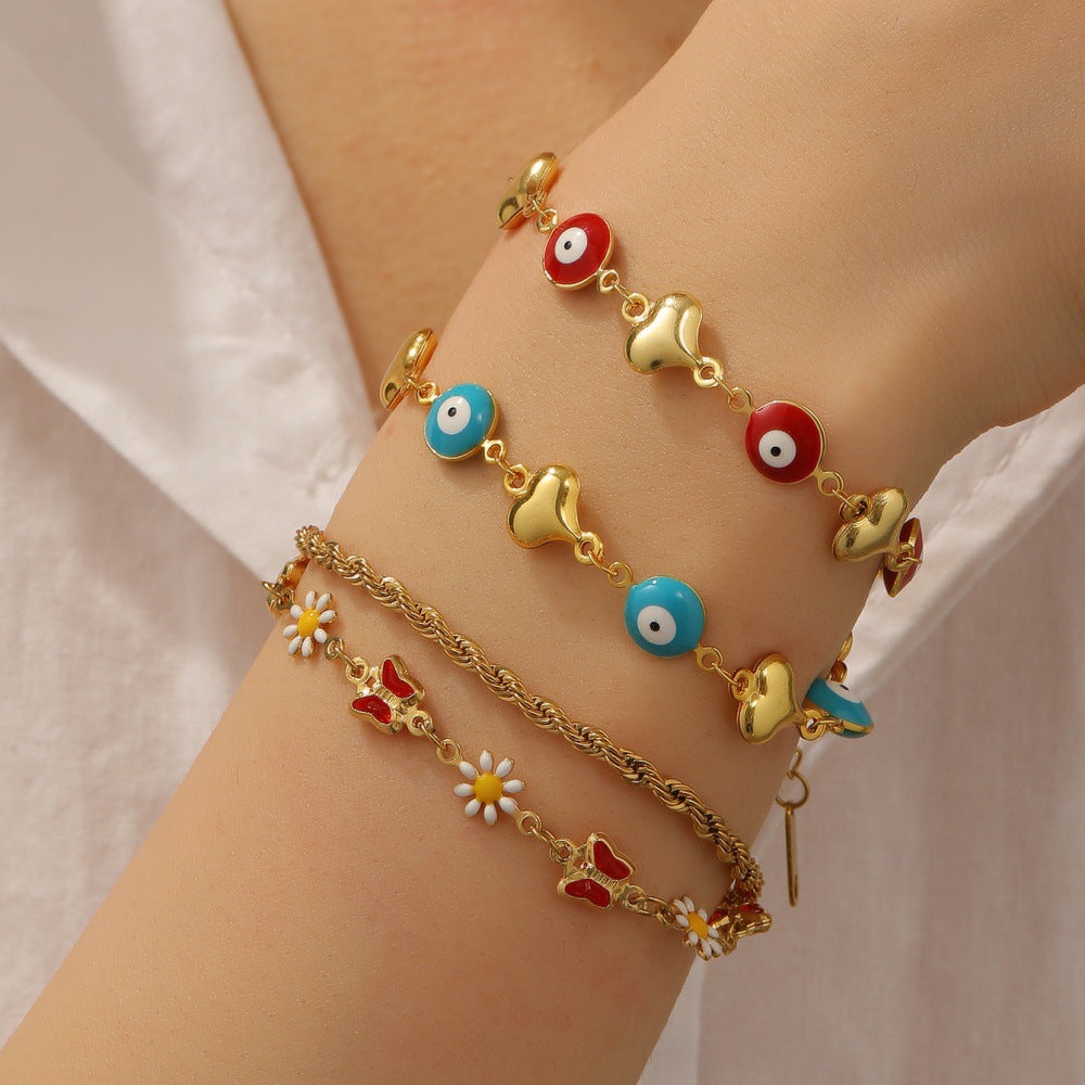 Bracelet femme avec pendentifs artistiques