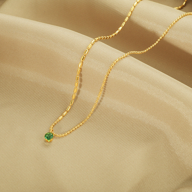 Collier pour femme plaqué or avec accent émeraude