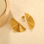 Boucles d'oreilles pendantes œil de tigre et cadre doré