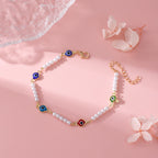 Bracelet perles et mauvais œil coloré