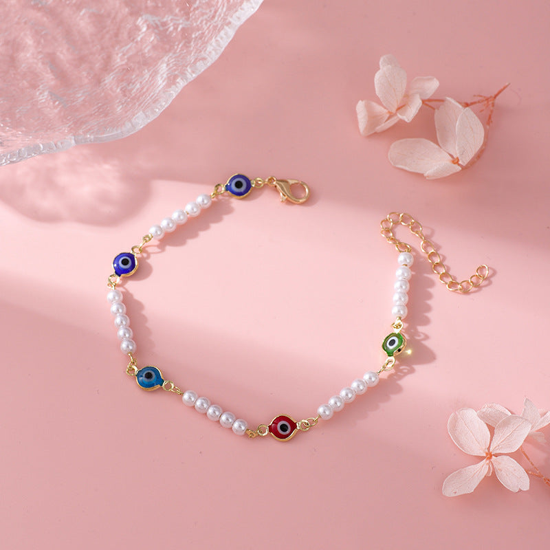 Bracelet perles et mauvais œil coloré